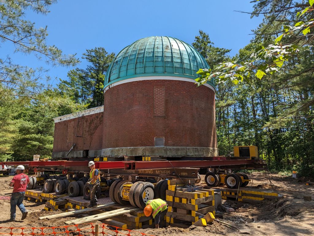 The Observatory is shown on a metal structure with wheels.
